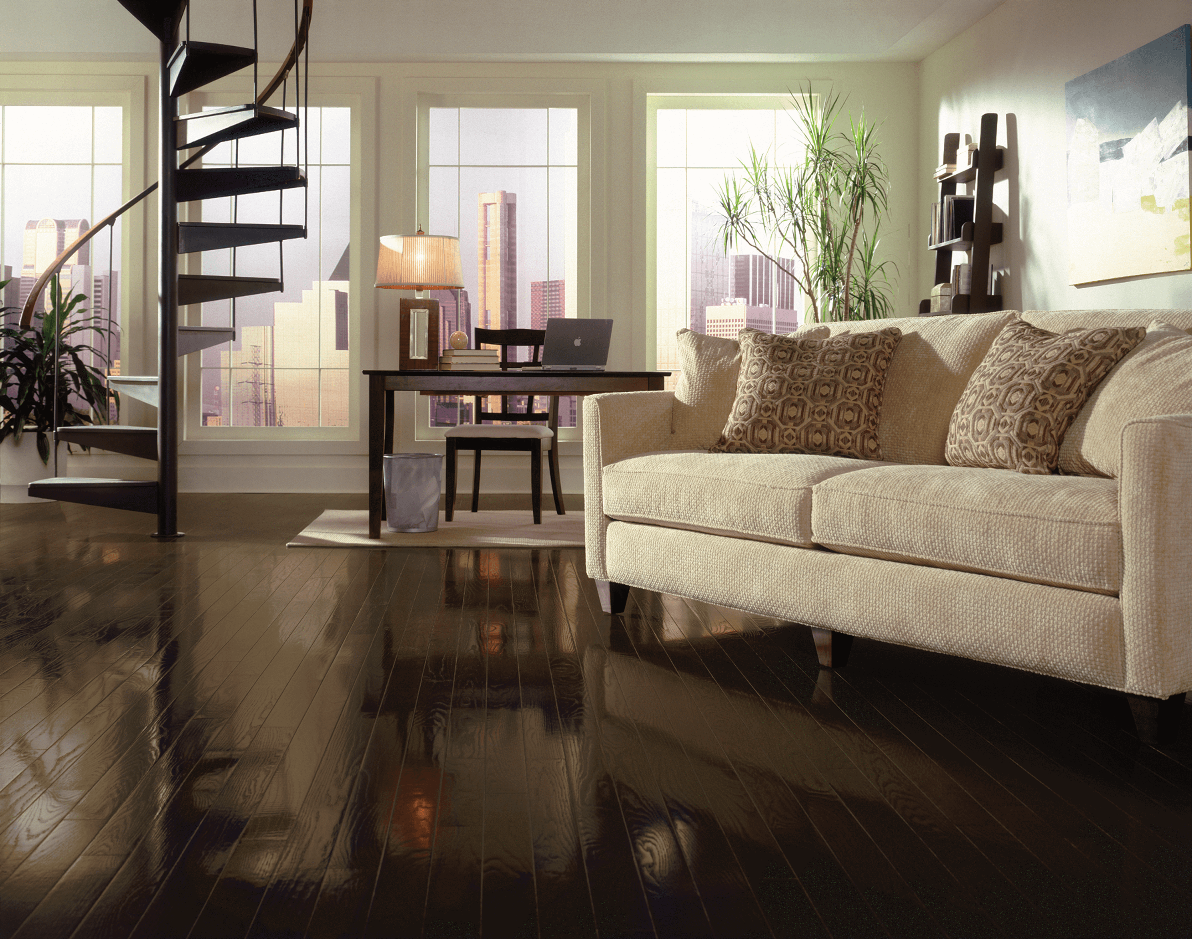 Dundee Red Oak Solid - Espresso Modern living room with a spiral staircase overlooking a city scape and using red oak flooring from Bruce
