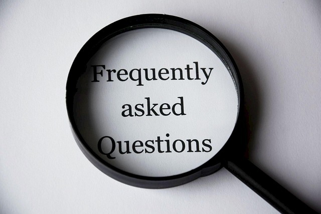 Magnifying glass with Frequently Asked Questions